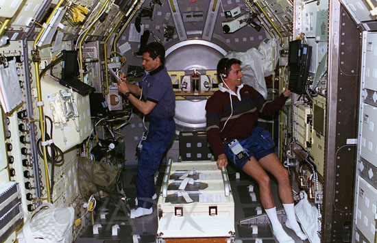 Astronauts working in space