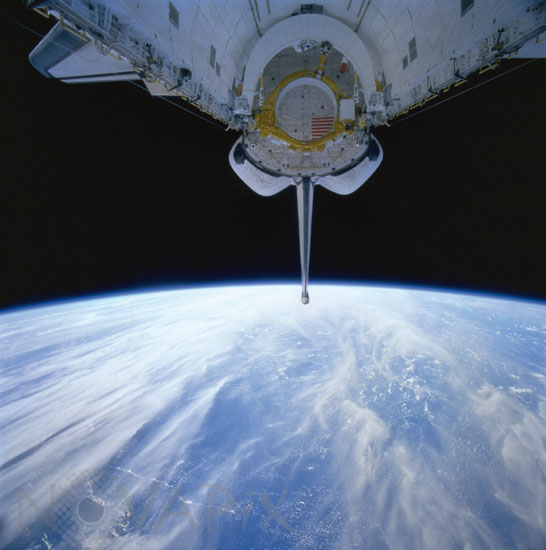 Space shuttle Columbia over Indian ocean. 07/1999
