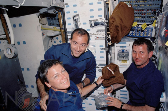 Astronauts in space shuttle Endeavour. 06/2002