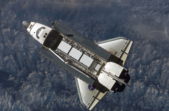 Shuttle Atlantis approaches the International Space Station 10/2002