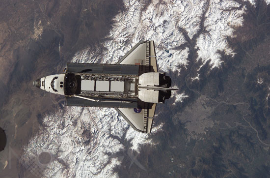 Shuttle Atlantis approaches the International Space Station 10/2002