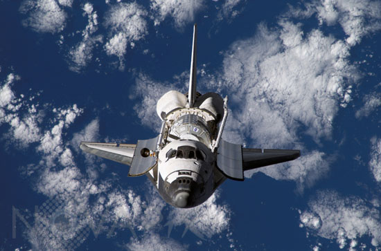 Discovery is manoeuvring seen from ISS 10-2007