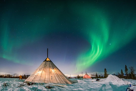 Aurore boréale sur un campement Sami - Norvège