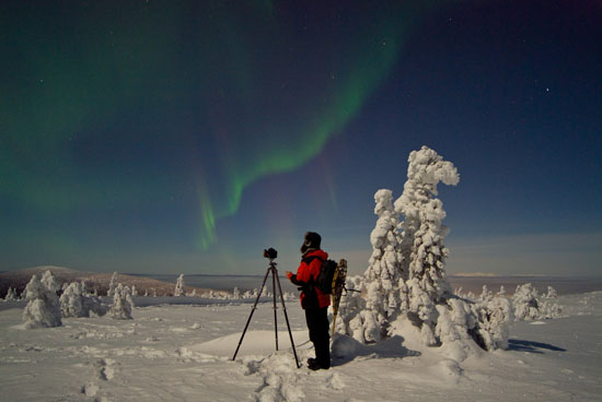 Aurora borealis and photographer - Finland