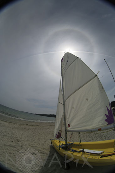 Sun Halo and contrail.