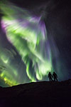Un couple observe une Aurore boréale - Norvège 