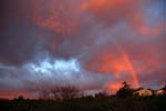 Arc-en-ciel observé au lever du Soleil