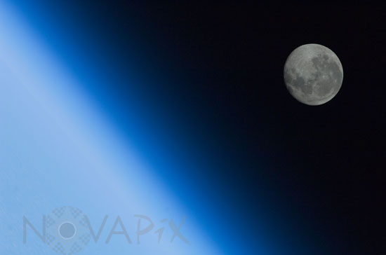 Gibbous moon above the atmosphere