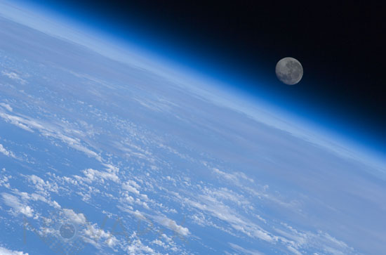 Gibbous moon above the atmosphere
