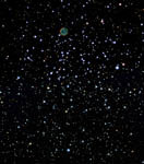 Amas d'étoiles M46 et nébuleuse planétaire NGC 2438 dans la Poupe