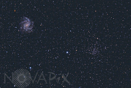 Spiral Galaxy NGC 6946 and Open Cluster NGC 6939