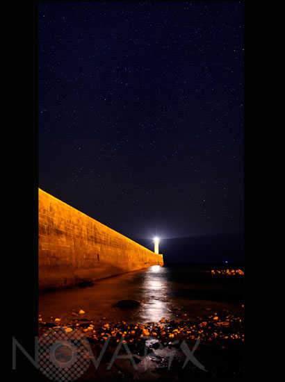 Lighthouse and starry night